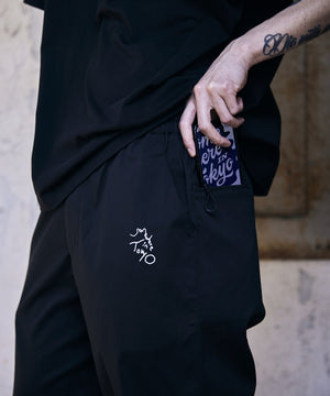 Logo Track Pants Desigin by Tomoo Gokita