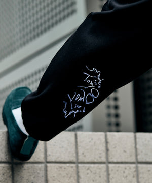 Melt Logo Sweat Pants designed by Tomoo Gokita